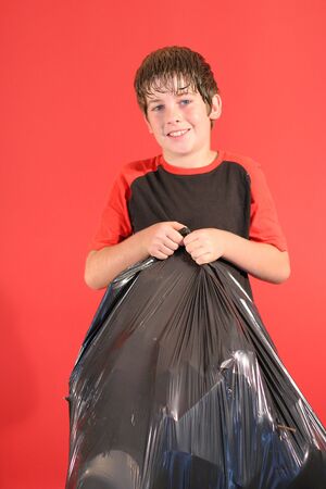 boy with trashbagの写真素材