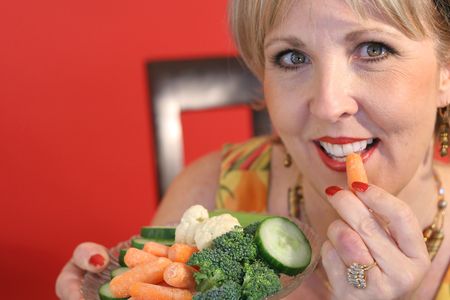 woman eating healthy foodの写真素材