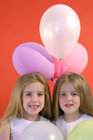birthday girls with balloonsの写真素材