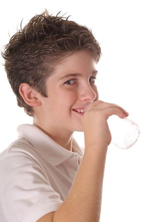 young boy drinking water verticalの写真素材