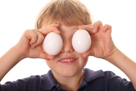little boy with egg eyesの写真素材
