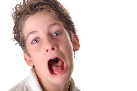 young boy scared screamingの写真素材