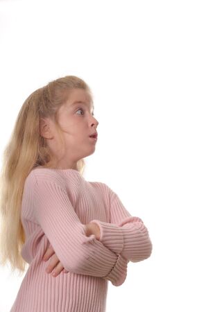 a childs serious surprised expressionの写真素材
