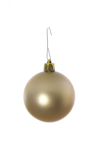 gold ornament hanging on whiteの写真素材