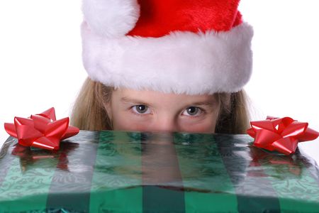 child peeking over a presentの写真素材