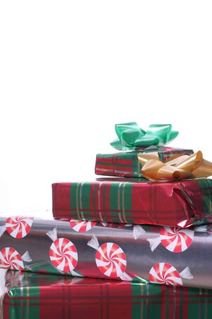 Christmas presents on white verticalの写真素材