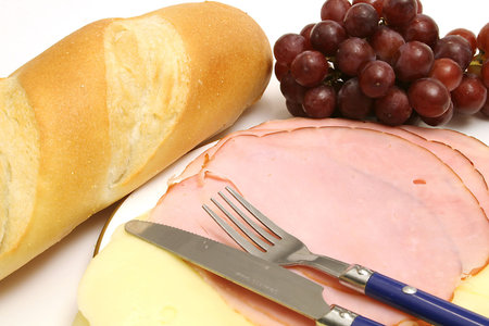 ham, grapes, bread and cheeseの写真素材