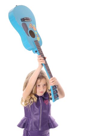 rockstar child smashing her guitarの写真素材