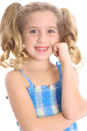 happy little girl thinkingの写真素材