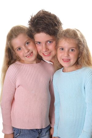 brother with twin sisters verticalの写真素材