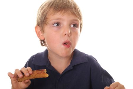 young child eating french toastの写真素材