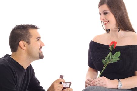 handsome guy proposing with diamondの写真素材
