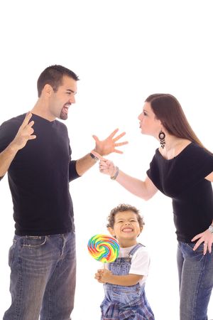 child with lollipop caught in the middleの写真素材