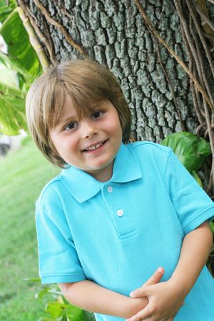 happy cute little boy outsideの写真素材