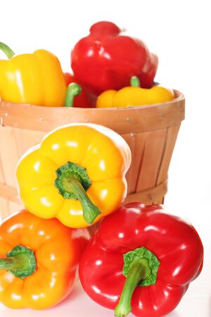 colorful peppers in a basketの写真素材