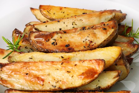 roasted rosemary garlic potato wedgesの写真素材