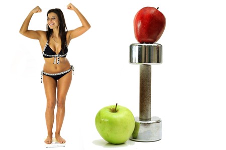 weight loss workout apples in bikiniの写真素材