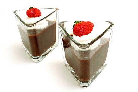 isolated photo of chocolate pudding with strawberrys on whiteの写真素材