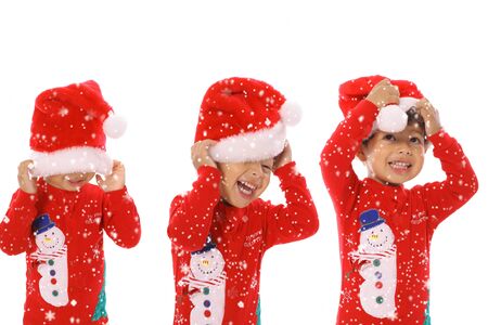 Three children Merry Christmasの写真素材