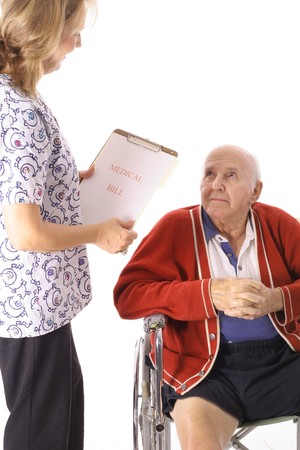 elderly patient talking to nurseの写真素材