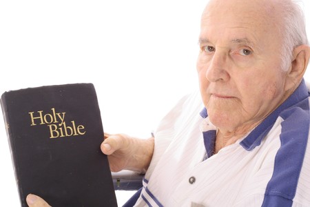 grandfather with a bibleの写真素材