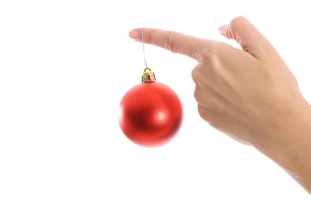 ornament hanging on womans fingerの写真素材