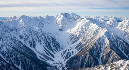 Panoramic view of the snowy mountains in winter.の写真素材