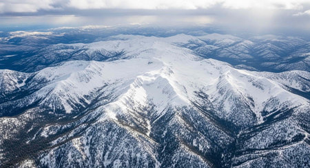 Aerial view of the mountains covered with snow. Winter landscape.の写真素材