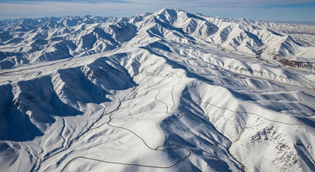 Aerial view of the snow-capped mountains of Kyrgyzstanの写真素材