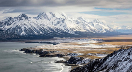 Panoramic view of snow capped mountains and sea, Patagonia, Argentinaの写真素材