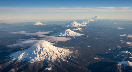 Aerial view of the snow-capped volcanoes of Kamchatkaの写真素材
