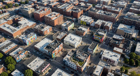 An aerial view of a vibrant urban cityscape with colorful buildings and streetsの写真素材