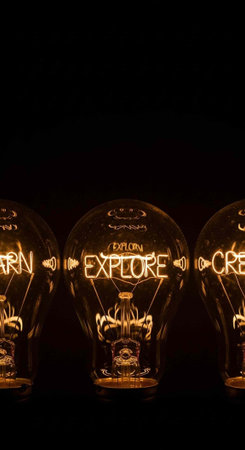 Three illuminated light bulbs with motivational texts inside on a dark background