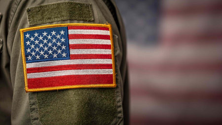 American flag on soldier's uniform, close-up. Flag of the United States of America
