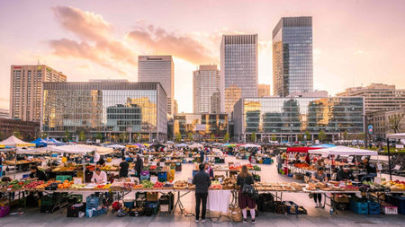 Unidentified people visit the food market in Frankfurt, Germany. Frankfurt is the 4th most populous city in Germany.