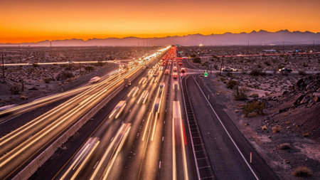 Long exposure of a highway at sunset in the Mojave Desert, California