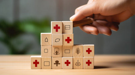 Wooden blocks with medical symbols. Healthcare, medicine and pharmacy conceptの素材