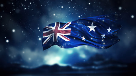 waving Australia flag against night sky with stars and snowflakesの素材