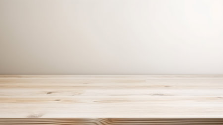 Empty wooden table in front of white wall. For product display.の素材