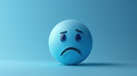 Sad blue emoticon with sad face on blue background. 3D renderingの素材