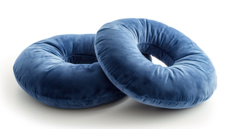 Blue soft pillow isolated on white background. 3d render image.の素材