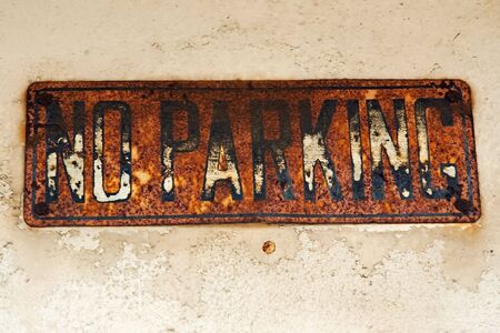 Old rusty no parking signの写真素材