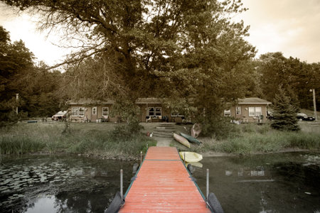 Summer vacation cabins by a small lake in the woods