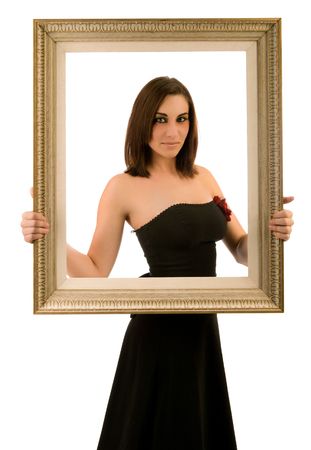 Beautiful young woman holding an antique picture frameの写真素材