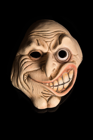 Scary Face Mask isolated on Black Backgroundの写真素材