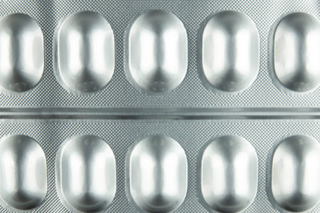Pills in a metallic color blister pack. Concept photo on theme Coronavirus