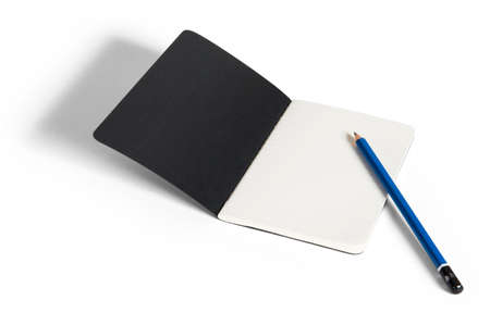 Open ruled notebook with pencil - with clipping pathの写真素材