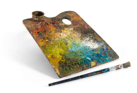 Art palette with brush and a rainbow of colorsの写真素材