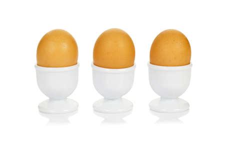 Eggs in egg cups の写真素材