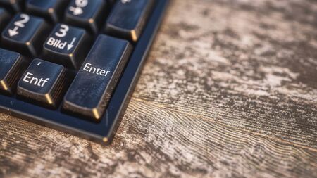 pc keyboard on a table with worn natural wood - 3D Renderingの写真素材